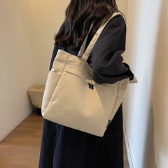 リュックサックの女性の新型通勤ファッションの特包女子学生の授業の補習とキャンプは本の手提げ袋を放します。