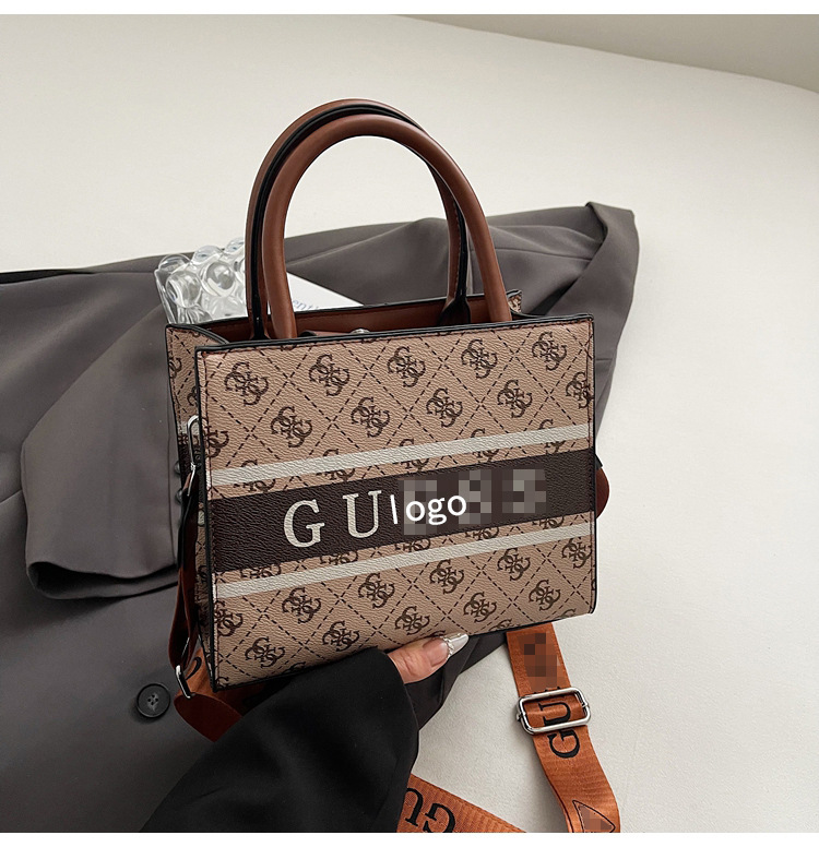 Bolso Tote impreso de comercio exterior transfronterizo Bolso bandolera de viajero de gran capacidad para mujer Bolso de letras clásicas de tendencia europea y americana