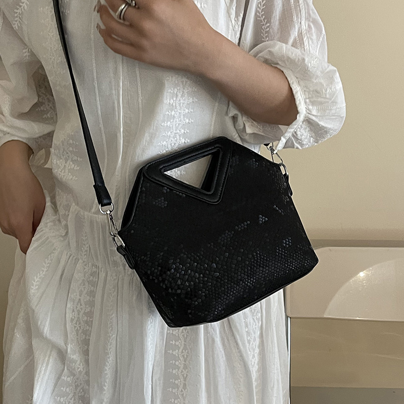 Bolso de textura transfronteriza 2025 verano nuevo estilo bolso de hombro con sentido de alta gama patrón de serpiente color contraste bolso de mensajero mujer