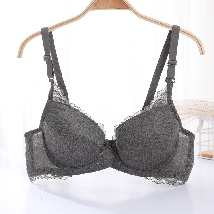 Fábrica de Shantou punto ajustable tipo de bra de mujer ligero y delgado con anillo de acero de soporte para juntar ropa interior de bra anti-caída