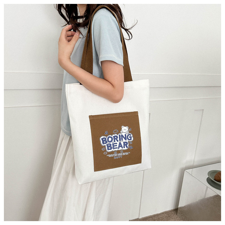Wholesale of 2025 new casual and fashionable canvas bags, large-capacity single-shoulder bags for college students' shopping, and trendy tote bags undefined