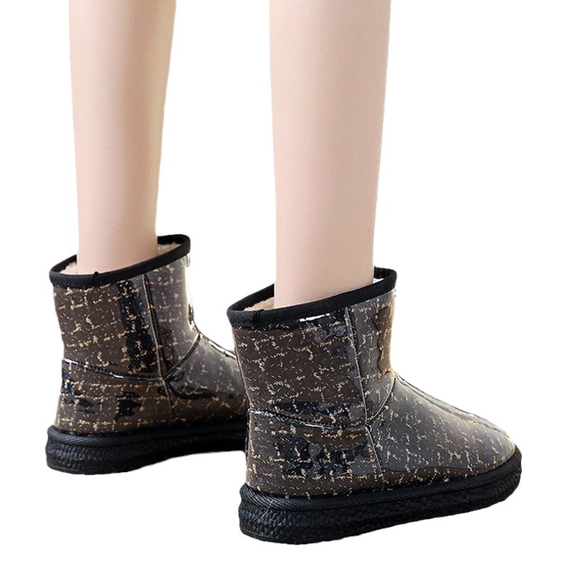 Botas de nieve de moda para mujeres nuevos zapatos de algodón de nieve antideslizantes impermeables gruesos con forro polar para mujeres