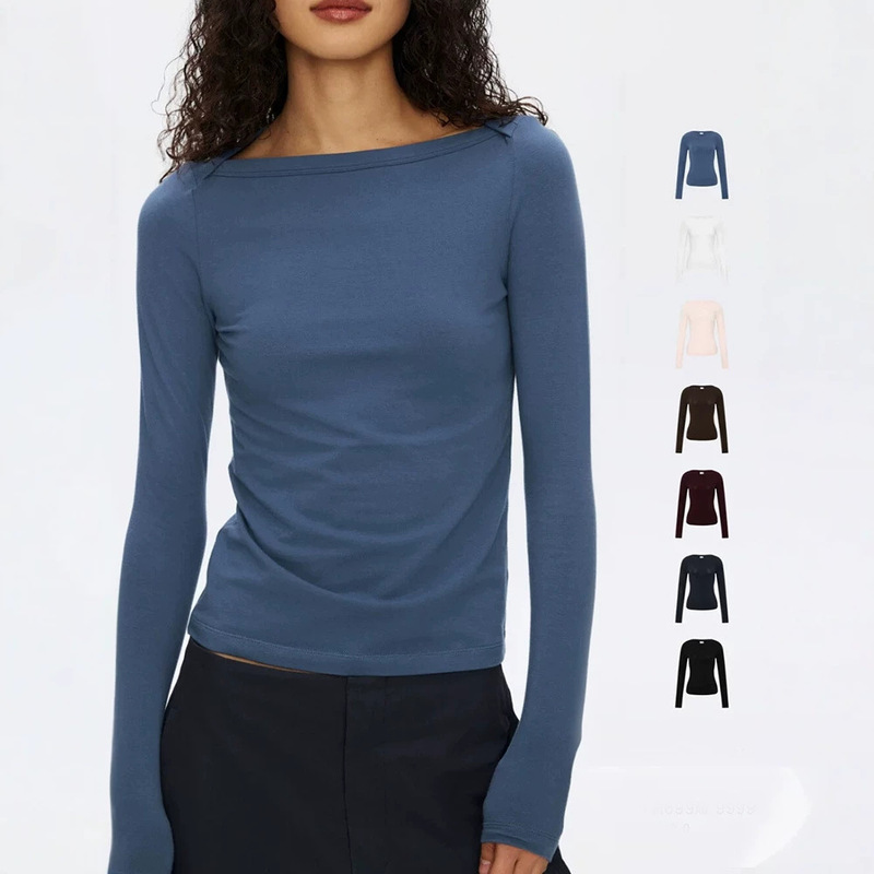 In stock: Simple, stretchy, slim-fit, boat-neck long-sleeve T-shirt for women, suitable for fitness, yoga, and as a sporty base layer In stock: Simple, stretchy, slim-fit, boat-neck long-sleeve T-shirt for women, suitable for fitness, yoga, and as a sporty base layer
