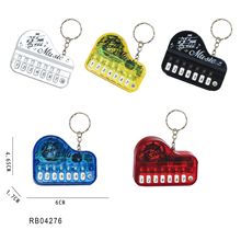 创意掌上可弹奏迷你电子小钢琴钥匙扣卡通电子琴发光音乐游戏玩具