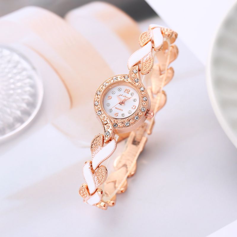 外贸新款镶钻奢华腕表女圆形小号盘时尚气质滴胶仿陶瓷手链手表女