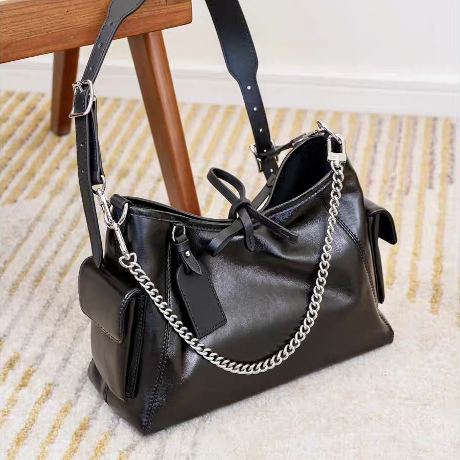 Bolso tote de alta gama y gran capacidad en los Estados unidos, mujer, otoño e invierno 2024, nueva moda, lleno de bolsos inclinados de un hombro para viajeros