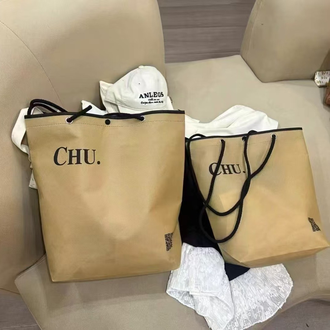 Handheld bag non-woven cloth