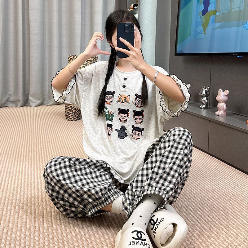 2025 新しい夏のモーダルパジャマ女性の半袖ズボンスーツ漫画ルーズ夏は家の服の外で着用できます|undefined