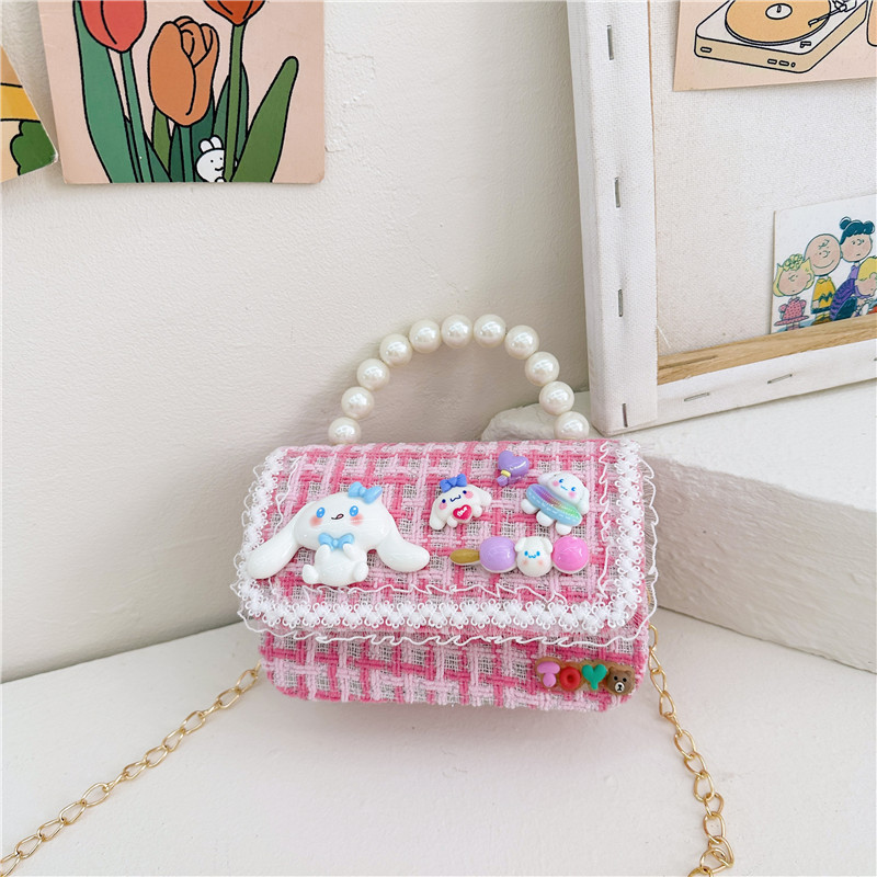 Otoño e Invierno nueva niña monedero dibujos animados lindo accesorios perla bolso versátil estilo occidental bebé bolsa de hombro