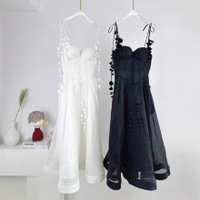 十三行澳洲小众海边旅游收腰显瘦真丝亚麻纯色吊带花瓣连衣裙热卖