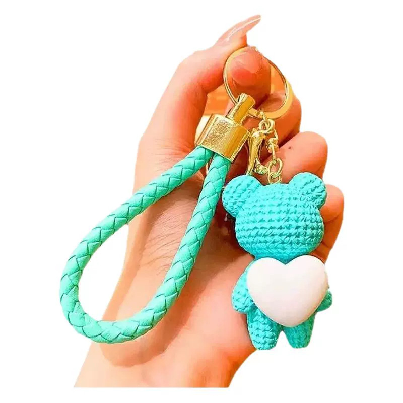 ネットの赤い愛の熊は善宰を背負ってぶら下げます。