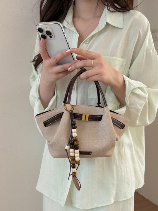 Nicho coreano bolsas de mano tote mujeres 2026 comercio exterior nuevo relajado sensación universal hombro mochila canasta de verduras