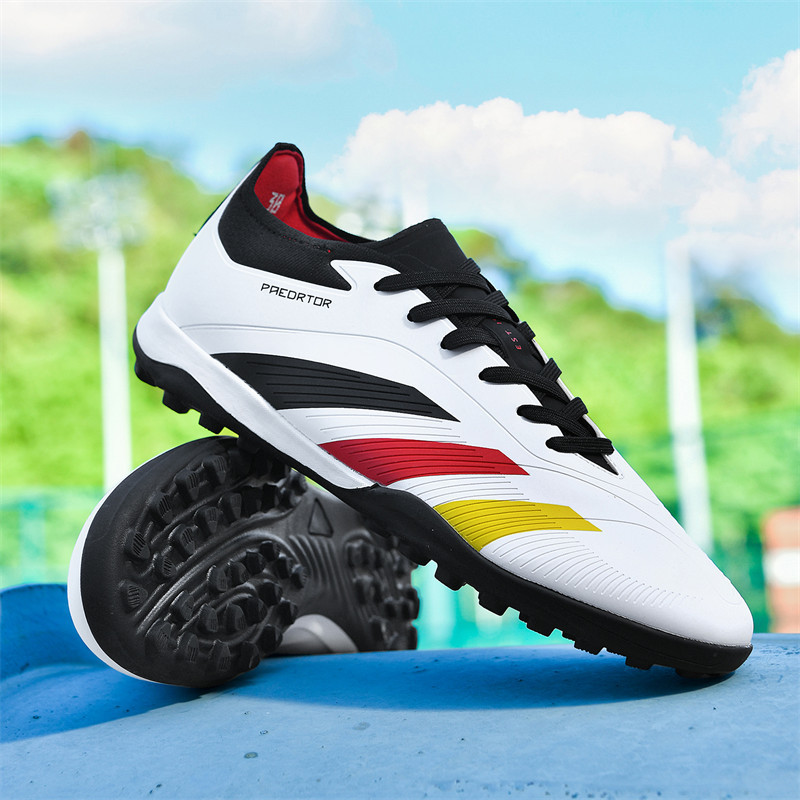 Comercio Exterior transfronterizo TF clavos largos sin costura zapatos tejidos voladores zapatos de fútbol juvenil zapatos de entrenamiento de clavos rotos de césped al por mayor