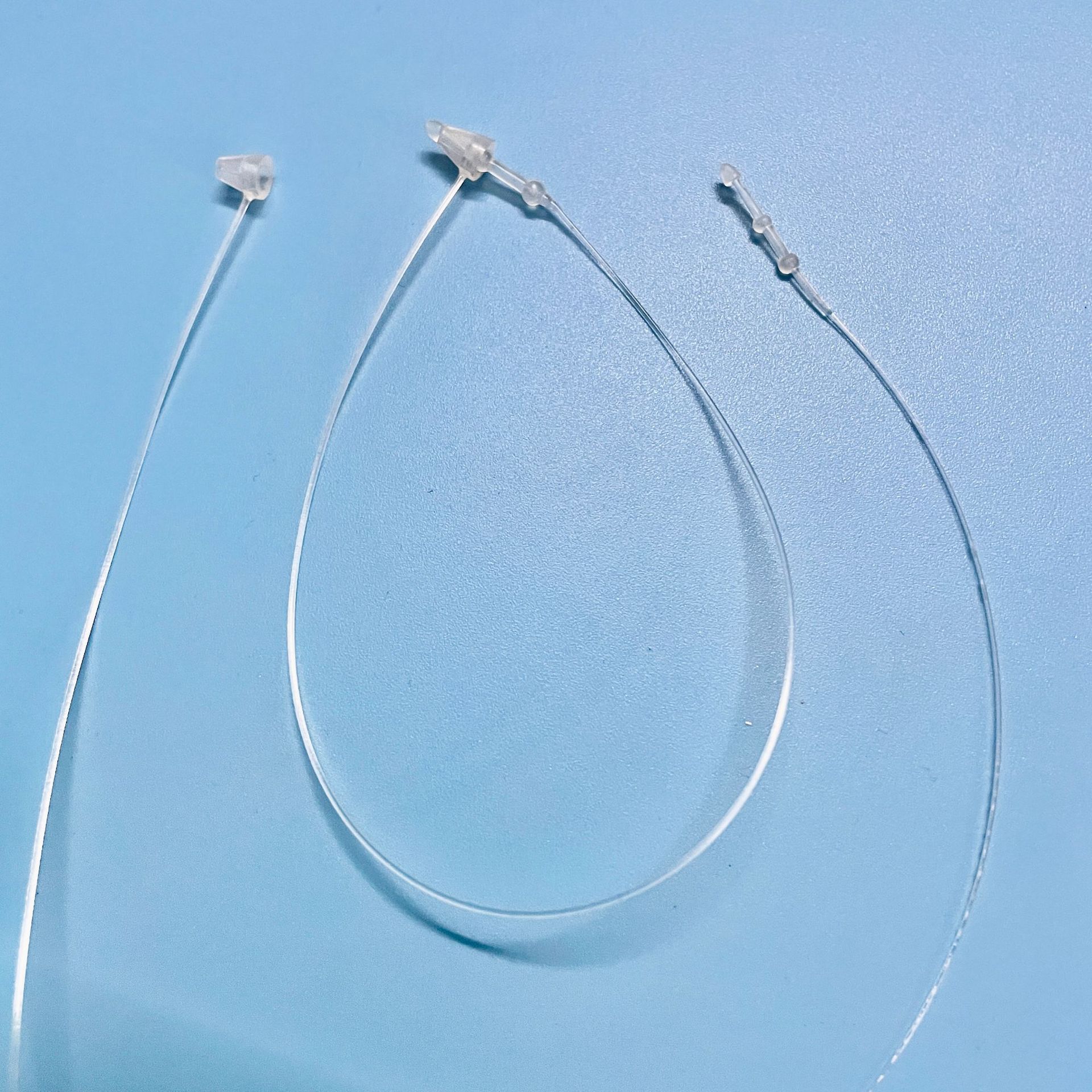 厂家供应吊牌子母扣 三叉头行李索 透明环保PP束条 手穿胶针挂绳