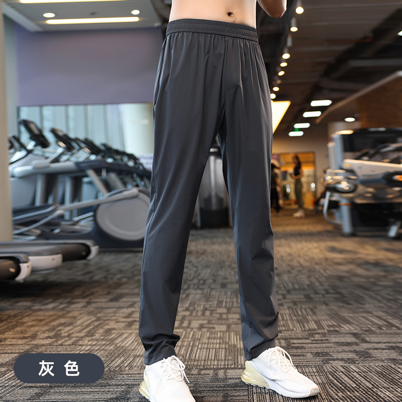 Fábrica de fuentes pantalones casuales para hombres micro-elástico rápido secado correr pantalones deportivos recto pantalones de moda jóvenes