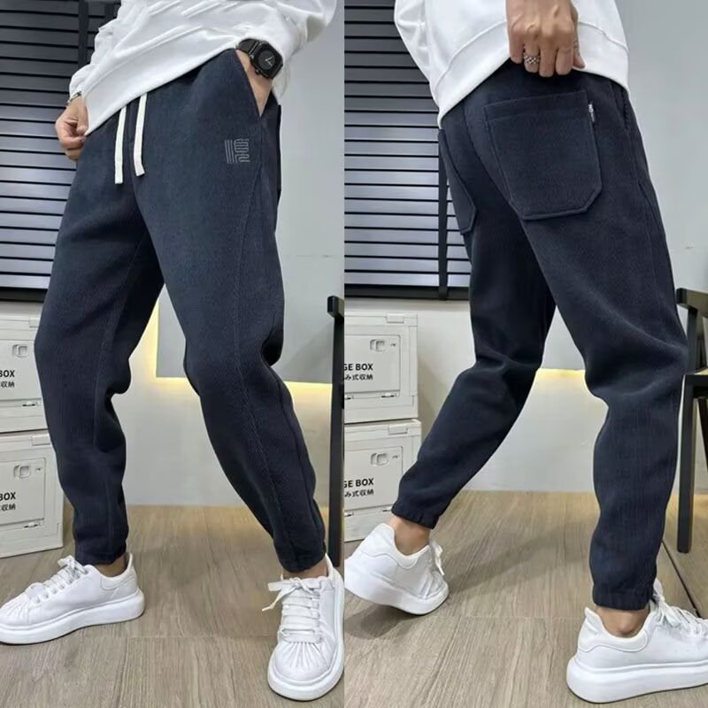 2025 invierno de lana más gruesa pantalones casuales de hombre calentamiento sueltos versátiles pantalones deportivos de empalme de moda