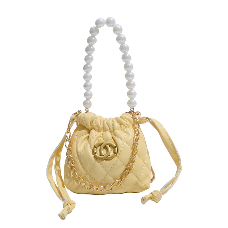 2026 nuevo niño cadena de perlas bolsos de diamante chicas moda mini bolsos de hombro caramelo princesa mochila
