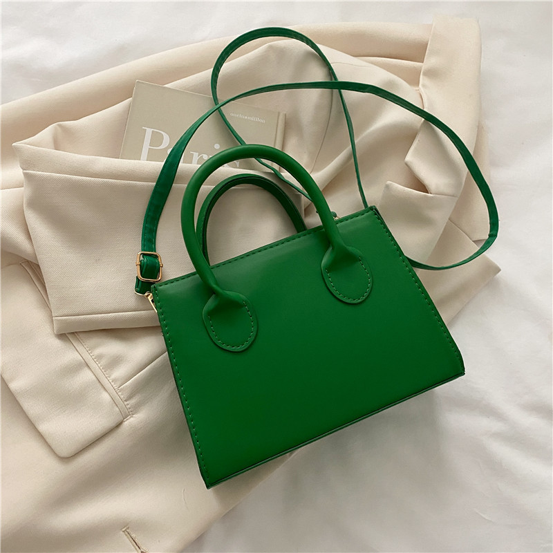2024 primavera Nueva Bolsa cuadrada pequeña bolsa de estilo coreano de moda de este año de color sólido mini bolso de las mujeres