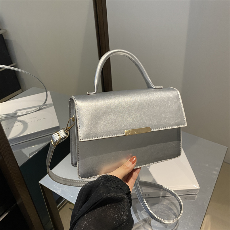 Este año la nueva explosión de bolsos de mujer de alta calidad sensación extranjera bolsos de mano versátiles ligeros de lujo nicho bolsos de hombro de un solo hombro