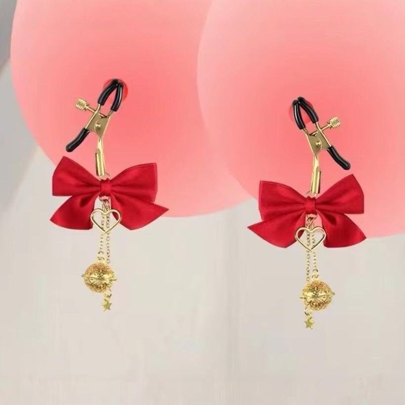 Fábrica directa de artículos sexuales SM esclavo femenina arco de cuentas cadena de leche clip pareja coqueteo artículos de venta