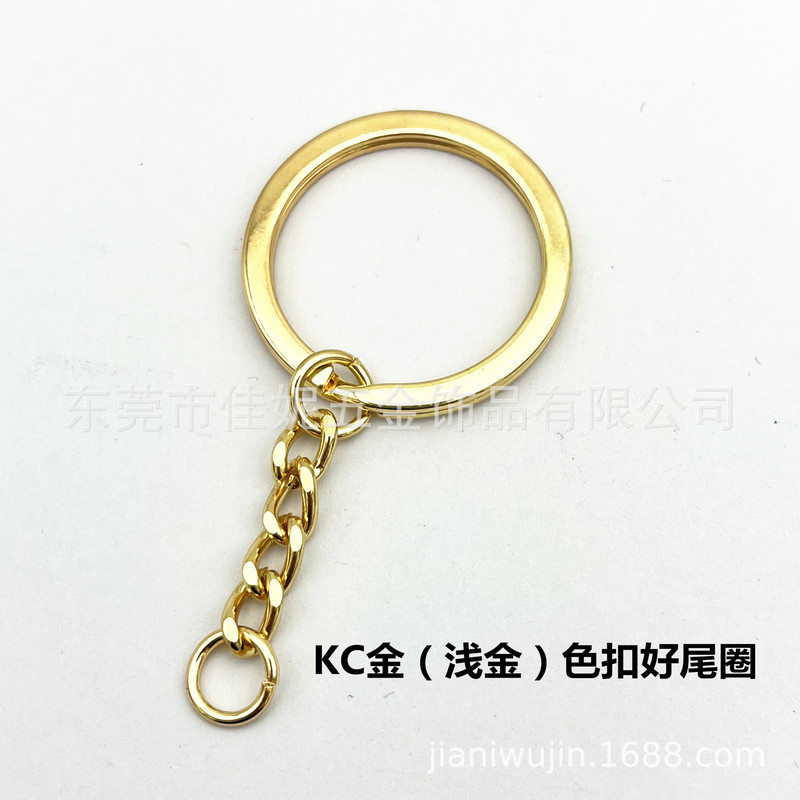 元のメーカーの現物の金色のキーホルダーは四つのチェーンを持っています。|undefined