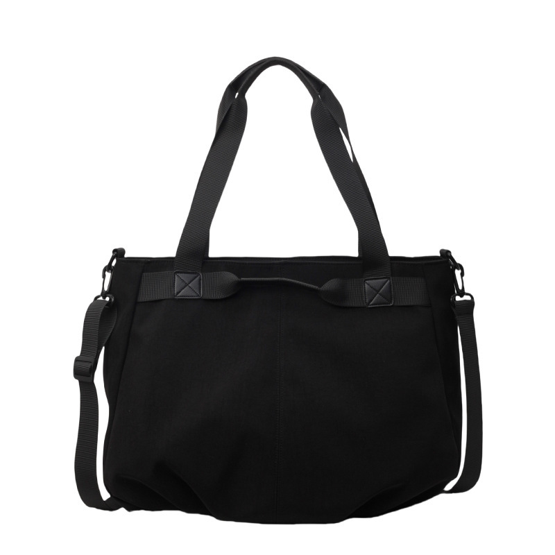 Bolsos de viaje transfronterizos de gran capacidad Bolsos de tela Oxford simples de moda femenina Bolsos tote de todo fósforo Bolsos de hombro de moda coreana