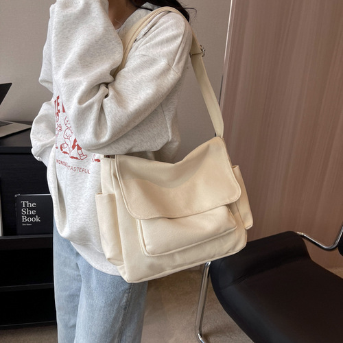 ins Korean style simple solid color versatile Japanese crossbody bag shoulder canvas bag male and female student class messenger bag