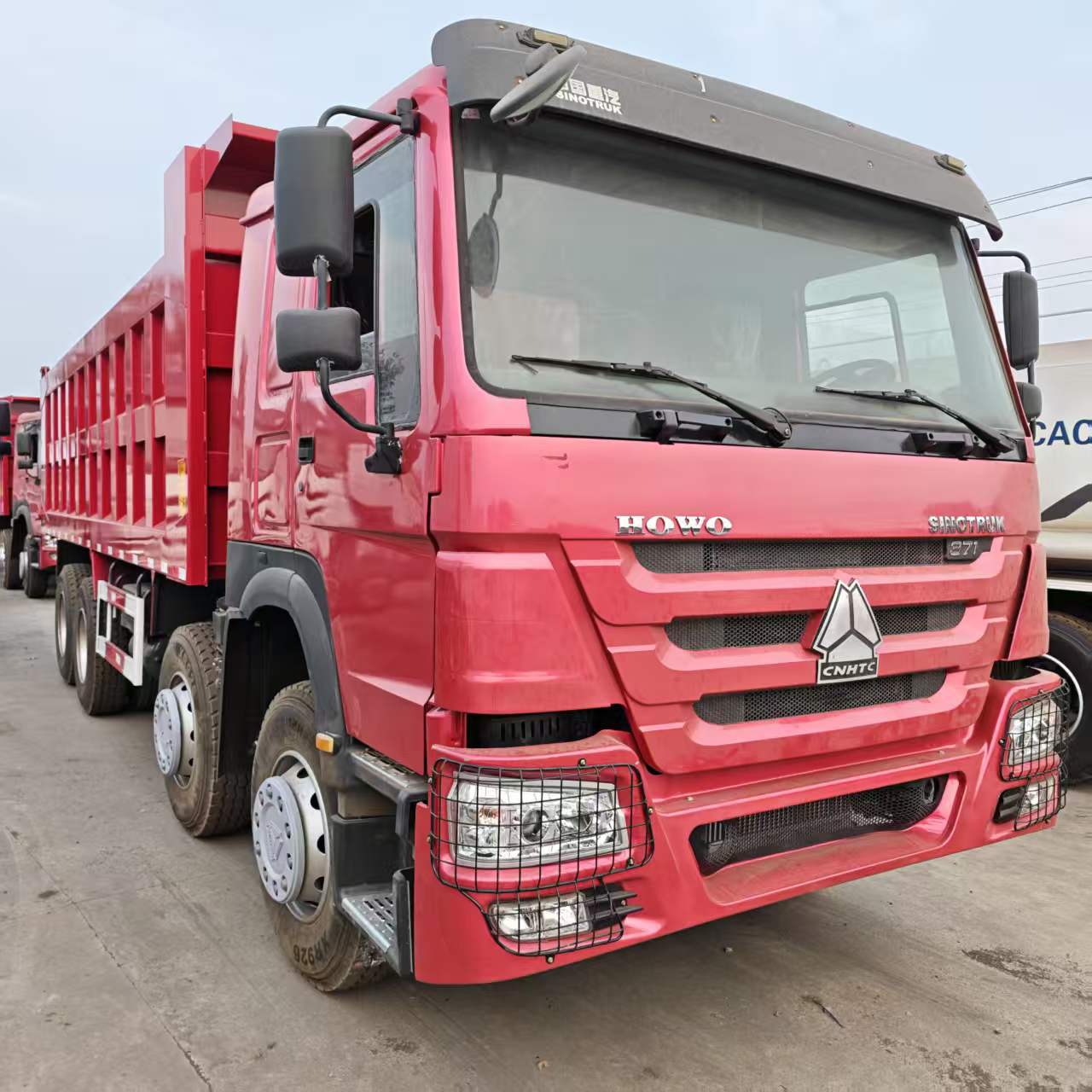 Current Stock for Export: Howo Dump Truck 8X4 Earthmoving Transport Tipper Truck, Heavy-Duty Dump Truck, Earthmoving Truck Parts