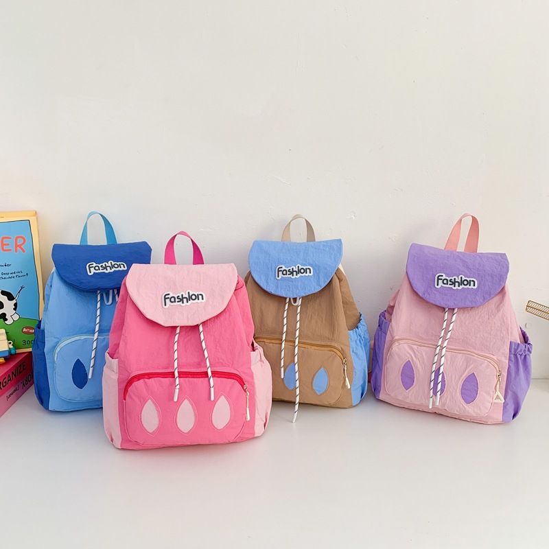 Nuevas bolsas coreanas para niños, viajes ligeros, mochilas de cubo, letras extranjeras, mochilas de cuerda flip