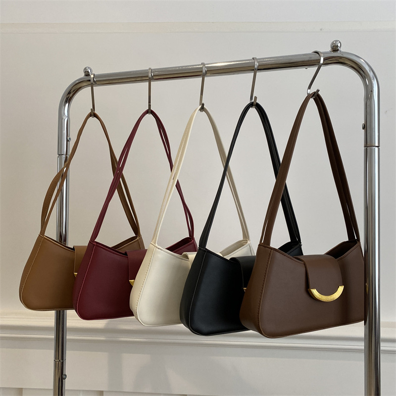 Textura de moda casual bolso bajo 2025, principios de primavera nueva personalidad ins bolso de hombro de aire extranjero, textura de moda bolso de mochila