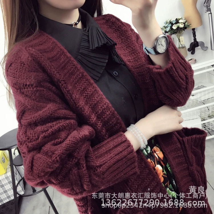 在庫の秋冬の女性の中の長いタイプのシンプルな気質のニットのカーディガンの外でマントを掛けます。|undefined