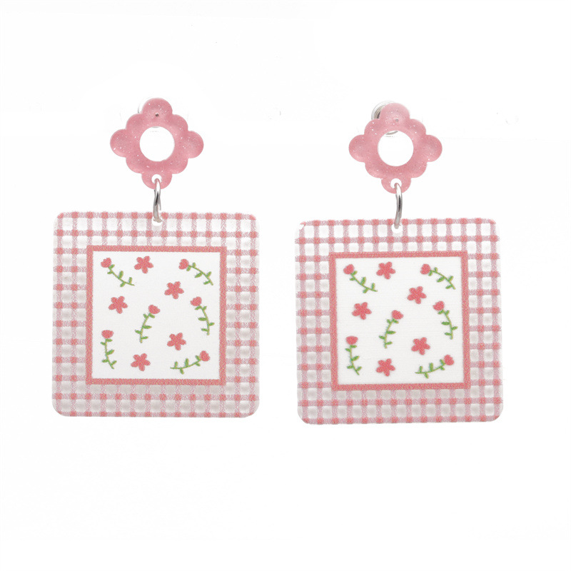 Pendientes geométricos de acrílico de acetato transfronterizo de Europa y América dulce Linda caricatura Smiley flor pintada Pendientes chapados en plata