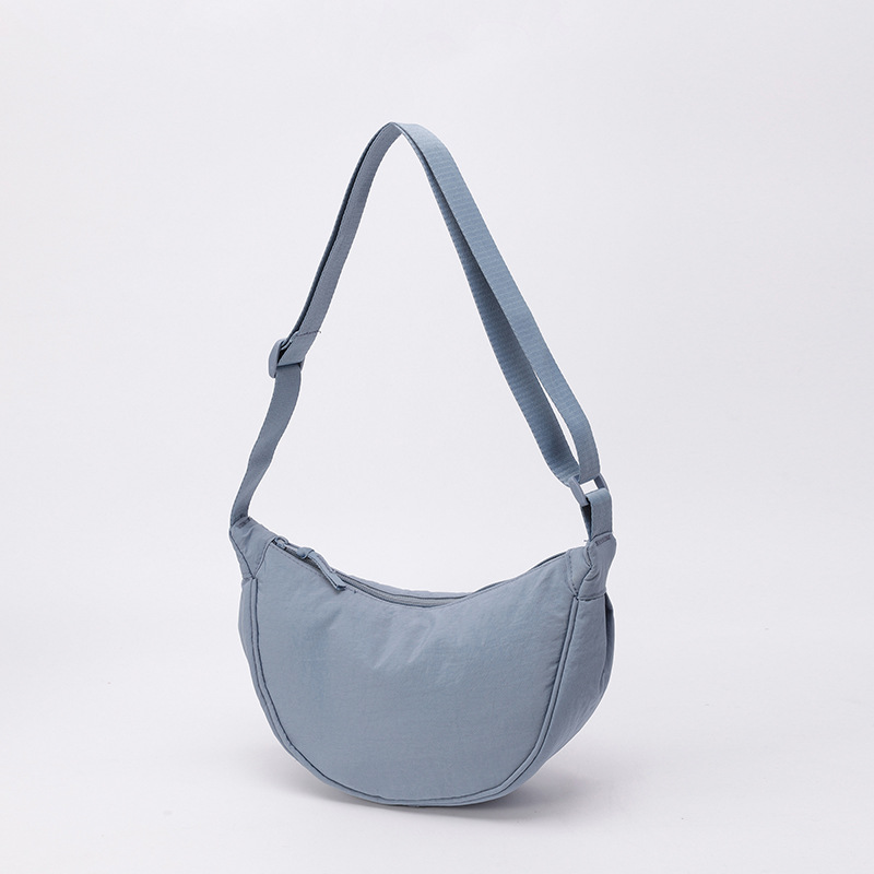 Bolso de tela pequeño bolso de moda ligero bolso de mochila de nylon transfronterizo mujer bolso de hombro casual versátil bolso de bolsas de bolsas de bollo de gran capacidad