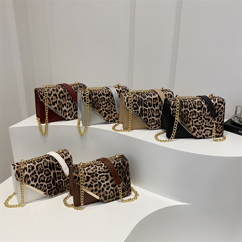 2024 invierno nuevo nicho diseño leopardo bolso de hombro de moda simple bolso de brazo cadenas mochila personalidad