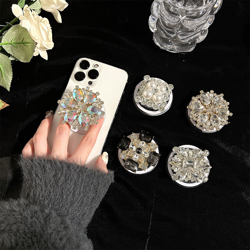 Women's new niche light luxury mobile phone airbag bracket magnetic Pearl Rhinestone gem retractable ins Wind support frame