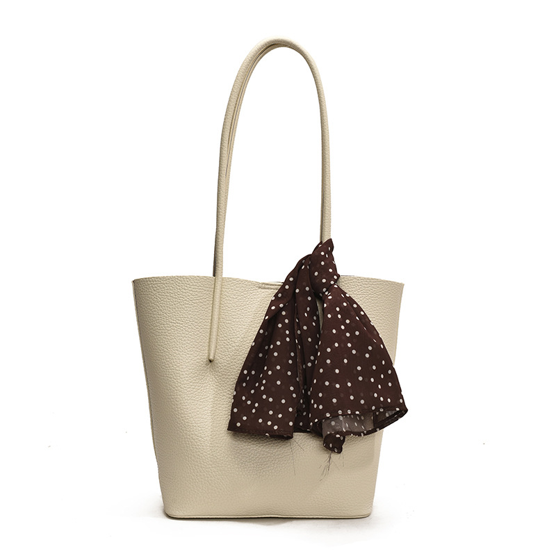 Bolsa especial ultra caliente transfronteriza para mujeres 2025 nueva textura versátil bolso axilar simple de gran capacidad mochila de viaje