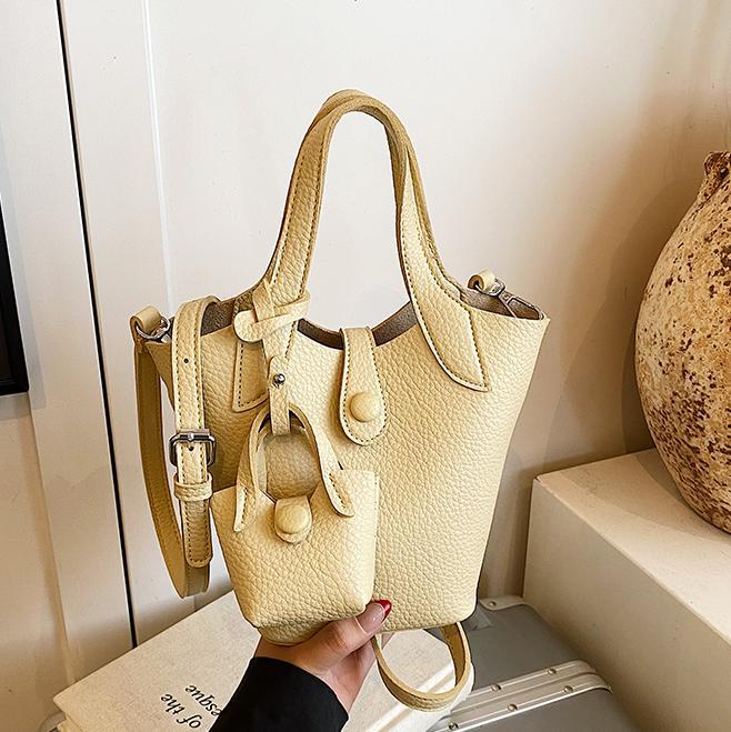 Tendencia de comercio exterior, bolsa de cubo de mano de nicho para mujer 2025 nuevo bolso de hombro casual de todo fósforo bolso de mensajero de moda de estilo occidental
