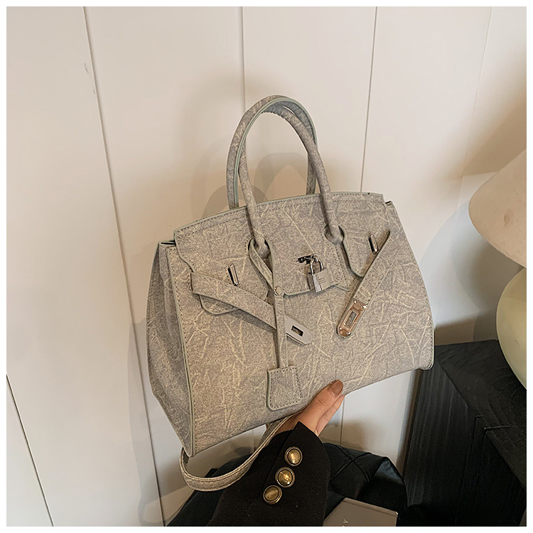Bolso de platino simple retro ventas calientes de mujeres nuevas moda transfronterizas de alta calidad Kelly bolso de hombro de gran capacidad
