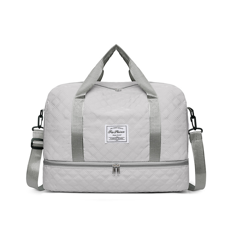 Bolsa de viaje de moda 2026 nueva simple separación seca y húmeda se puede ajustar la barra de tracción bolsa de ejercicio de gran capacidad de expansión bolsa de almacenamiento