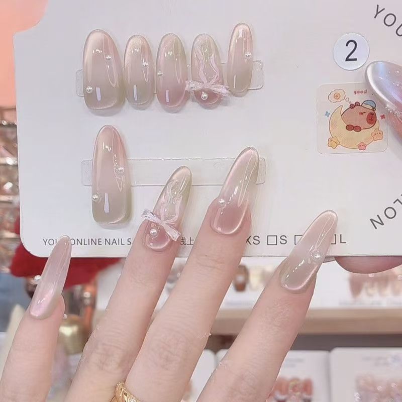 Melocotón Limina Pura hecha a mano con armadura intermitente ojo de gato degradado mariposa temperamento ligero lujo uñas de uñas removibles