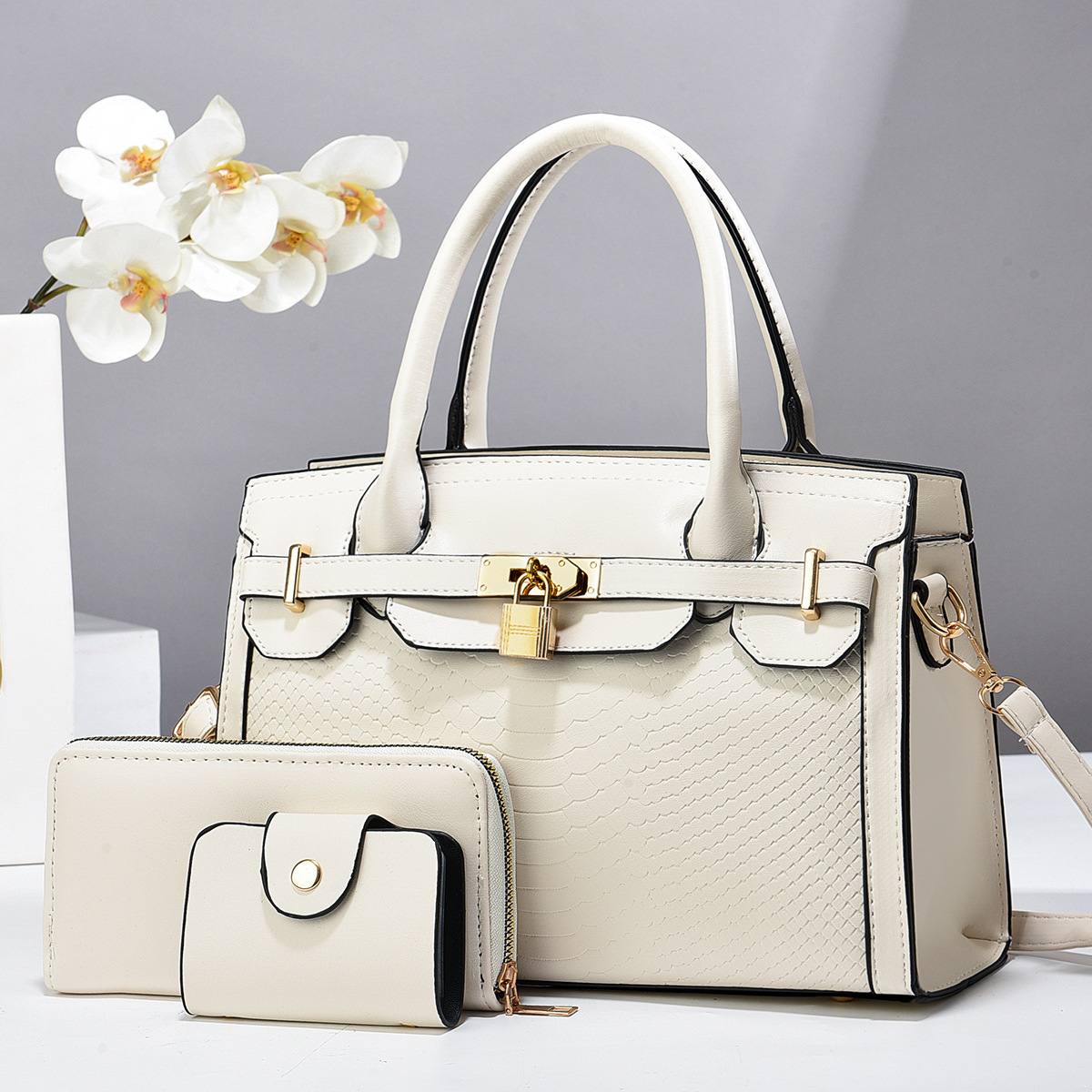 Taizhou bolsos de mujer bolsos grandes bolsos de tres piezas bolsos de cerradura colgante bolsos de comercio exterior