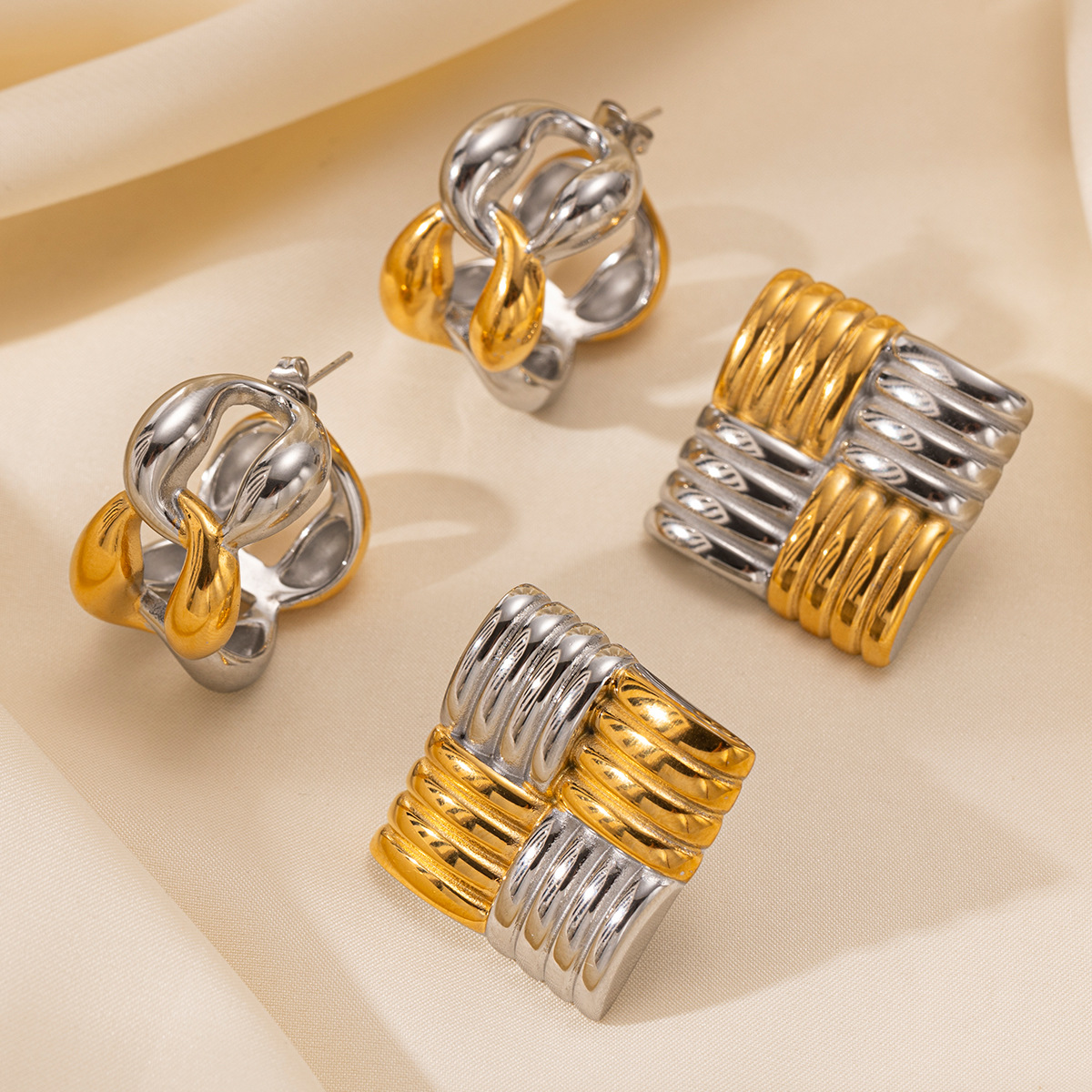 Taina estilo europeo y americano pendientes de acero inoxidable lujo ligero de alta calidad estilo de diseño versátil sensación de pendientes de acero de titanio para mujeres no se desvanecen