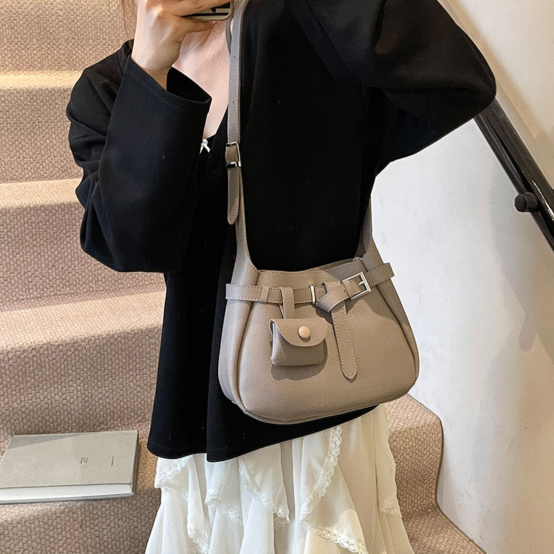 Bolso de cubo de aire extranjero de tendencia transfronteriza para mujer 2025 nuevo bolso de mensajero de viaje casual bolso de hombro de axila de moda de todo fósforo