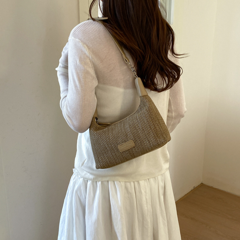 2026 verano nuevo estilo de moda bolsa de paja portátil diaria bolsas de bolsas