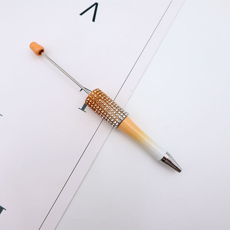 Bolígrafo giratorio de grano lindo de color degradado de tendencia de alto valor Bolígrafo de gomas galvanizado con cuentas de diamantes de bricolaje creativo