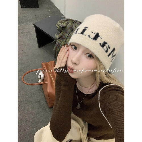 Retro contrast color stitching knitted sweater women's early autumn design slim thin shoulder top