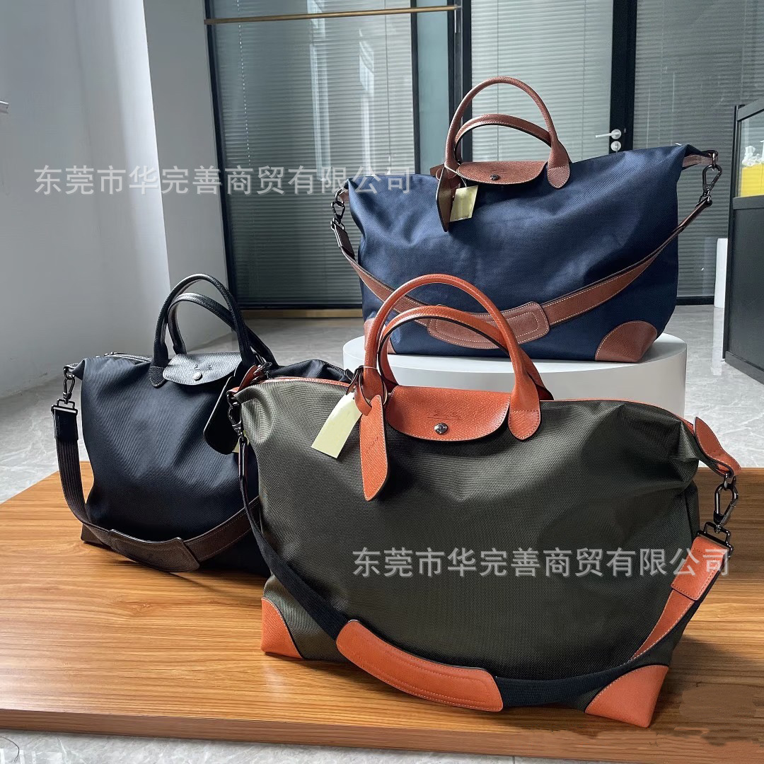 跨境骧家新款大容量尼龙手提行李包男女通用旅行袋轻便斜挎健身包