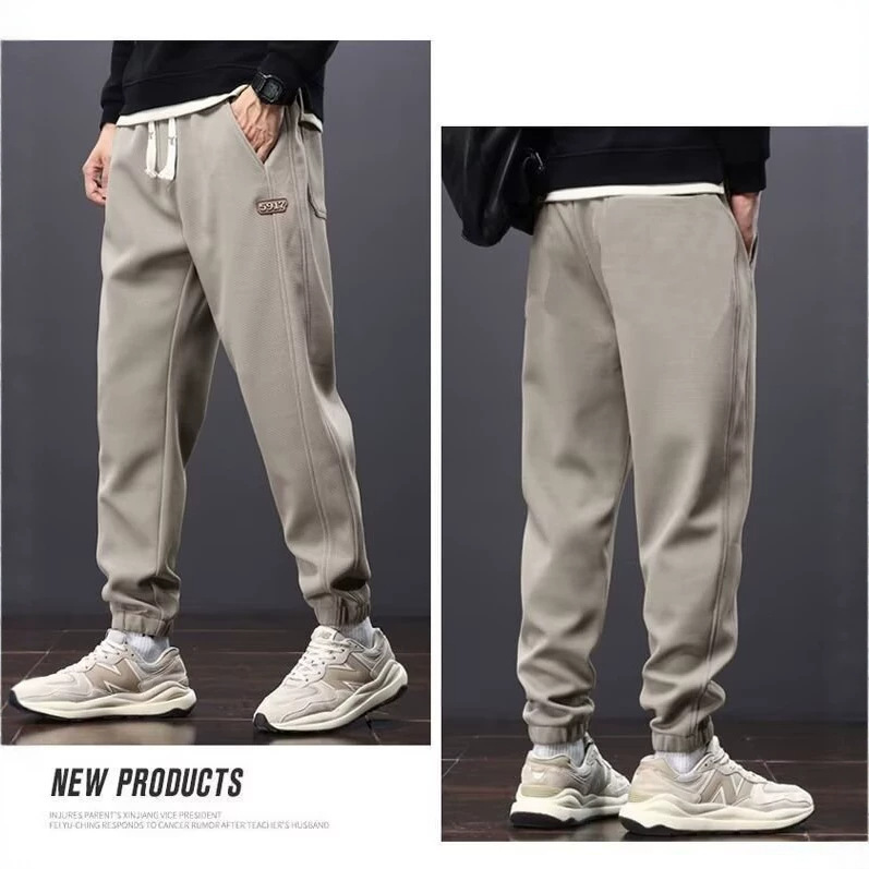 Foreign trade spring and autumn men's casual pants 2026 new style sweatpants trendy brand loose drawstring jogger pants casual men's pants Foreign trade spring and autumn men's casual pants 2026 new style sweatpants trendy brand loose drawstring jogger pants casual men's pants