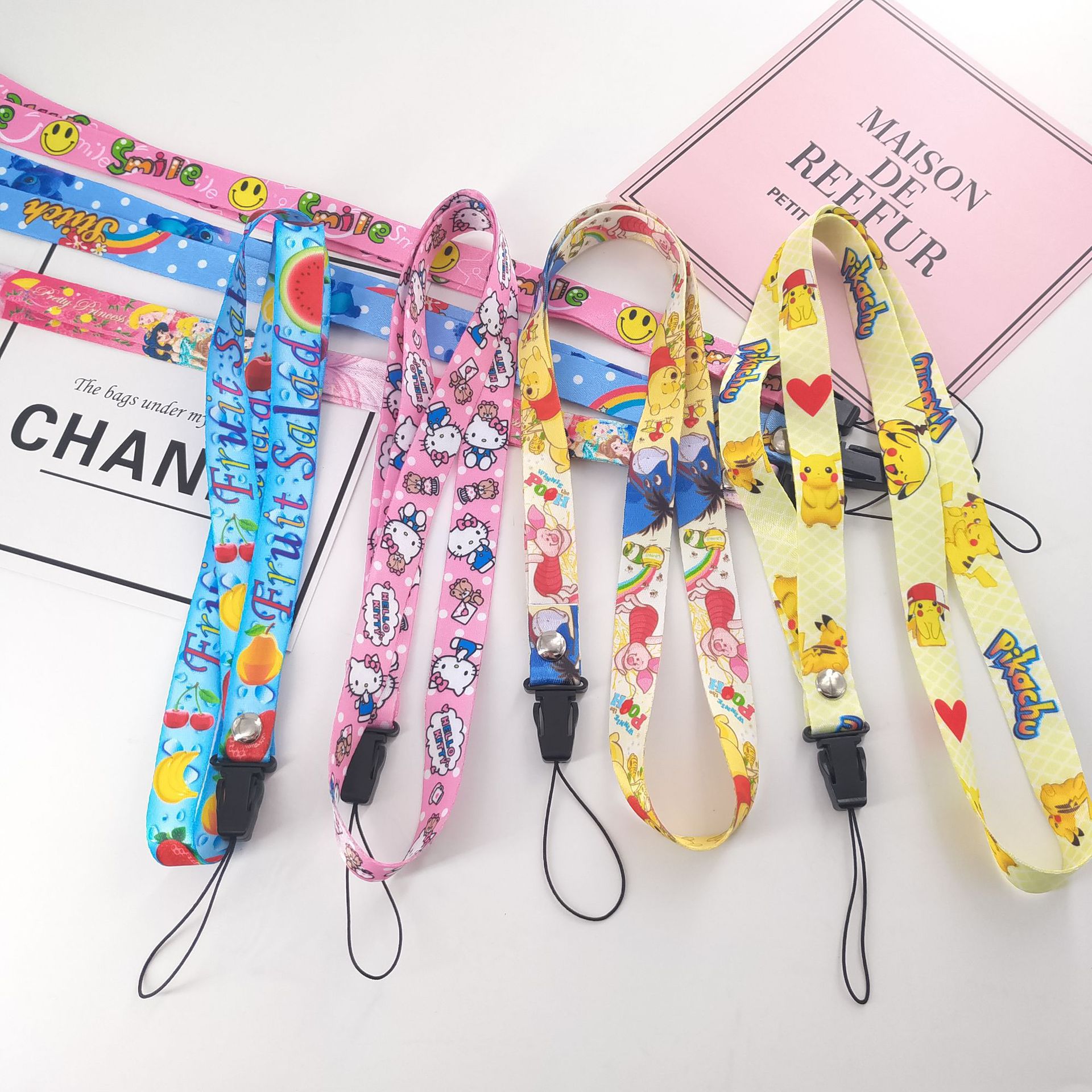 Cordón de teléfono móvil de dibujos animados Cordón de serie resistente a la caída Cordón de dibujos animados lindo cordón creativo floral requiere al por mayor