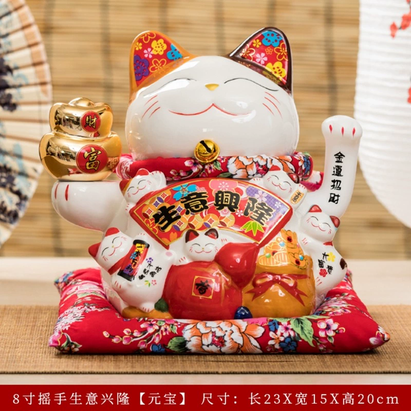 7 -inch wealth cat ornament shakes hands.